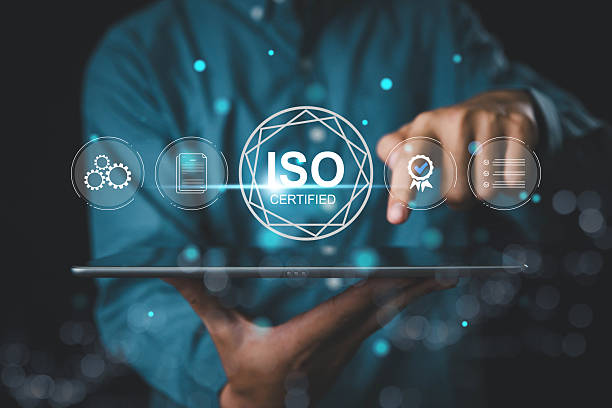 istock ISO certification and quality assurance, Businessman using laptop computer with quality assurance and document icon for ISO, Standards, Top service for product quality management. 2219293850