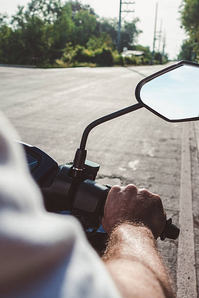 istock Attractive man riding a motorcycle. Sunny day 2219294060