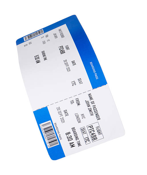 istock One airplane ticket isolated on white. Traveling abroad 2219295450