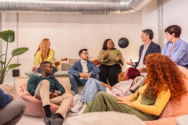 istock Coworkers playing with a ball during a break in the office 2219295600