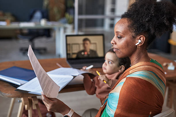 Working Mother Handling Business From Home