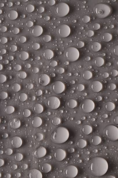 istock Water drops on gray background, top view 2219300595