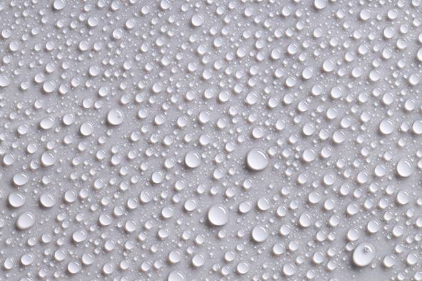 istock Water drops on gray background, top view 2219300631