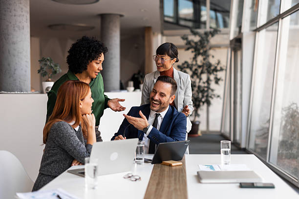 istock Diverse Business Team Collaborating Enthusiastically in Modern Office Setting 2219300652