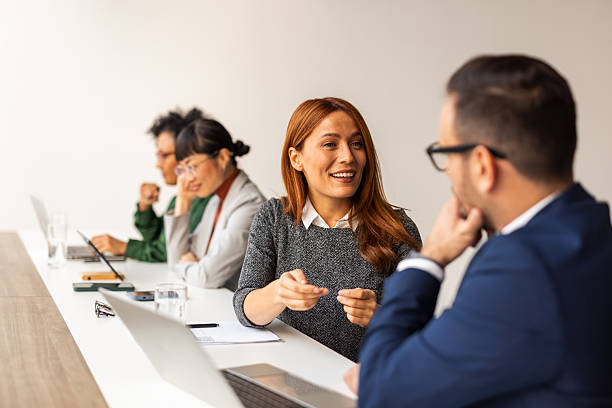 istock Business Professionals Engaged in a Collaborative Office Discussion 2219300856