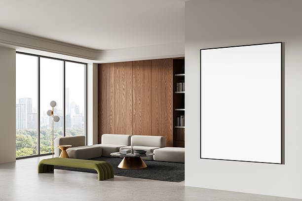 istock Modern interior living room with blank poster frame, city view through large windows, and minimalist furniture in neutral tones and wood accents. 3D Rendering 2219300862