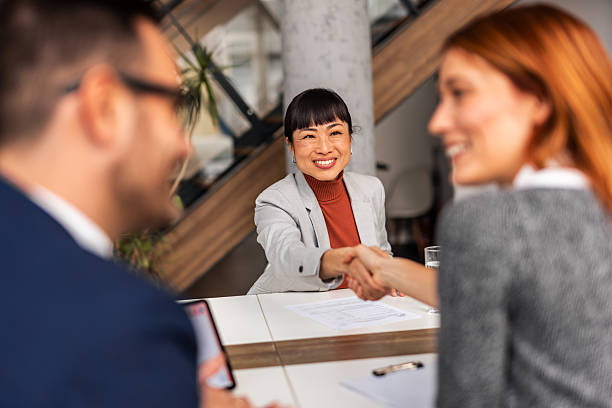 istock Professional Business Meeting with Handshake in Modern Office Setting 2219301726