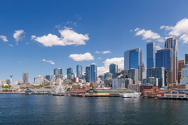 istock Bright and sunny panoramic view of Seattle skyline from the water 2219302115