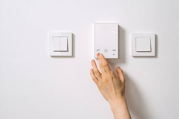 istock Modern apartment entrance with touch control panel and light switches 2219304507