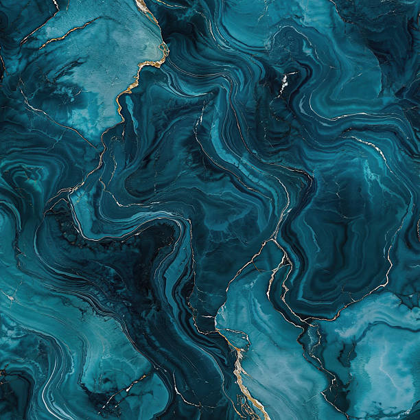 istock Dark Blue Swirling Marble Texture with Gold Accents 2219308066