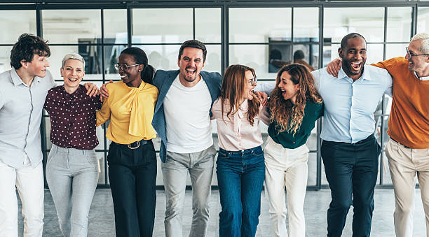 istock Diverse Team of Professionals Standing Together in a Modern Office 2219308138