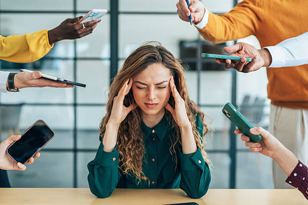 istock Overwhelmed Professional in a Busy Environment 2219308143