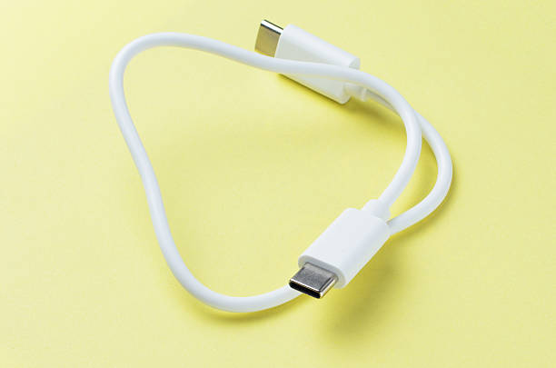 istock USB Type-C connector plug close-up isolated on yellow background 2219310893