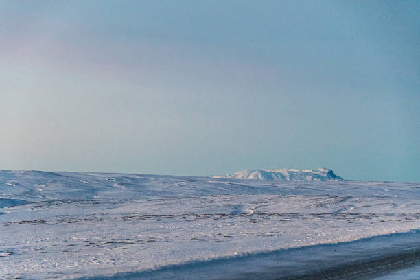 Early winter morning on a frosty highway between Laugervatn and Thingvellir national park in south western Iceland.