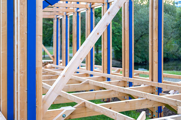 wooden frame beams commercial building in progress, construction elements, skeletal frame, building progress, raw materials, development project