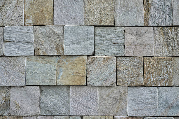 Texture of a Wall Decorated with Natural Stone Cubes