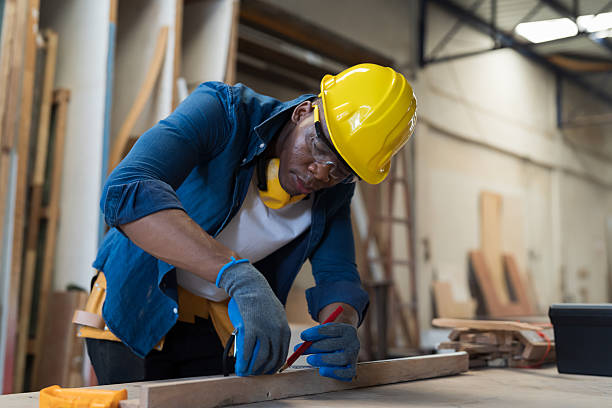 istock Black people, Carpenter and furniture workshop. African American male carpenter using tools for making furniture from wood in furniture factory. One male carpenter and small business in workshop 2219323401