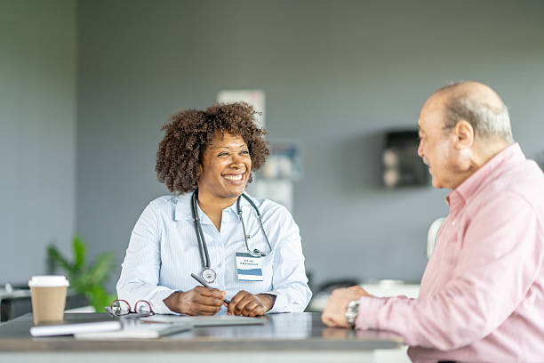 istock Friendly Doctor Consulting with an Elderly Patient in a Modern Clinic 2219327207