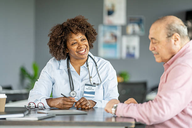 istock Doctor Meeting Patient During a Consultation in a Modern Office Setting 2219327526