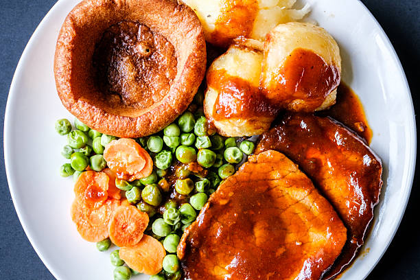 London UK, June 09 2025, Roast Beef Vegetables and Yorkshire Pudding Traditional British Sunday Roast