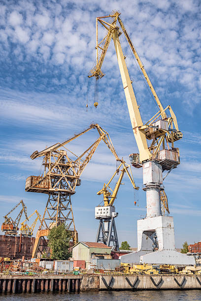 istock Large cranes working in the shipyard. Industrial landscape. 2219332115