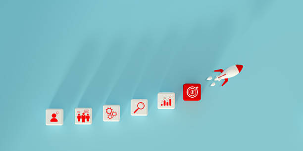istock 3D illustration with a rocket and icon blocks symbolizing business growth, innovation, teamwork, strategic planning against a minimalistic light blue background, Marketing and leadership concepts. 2219332433