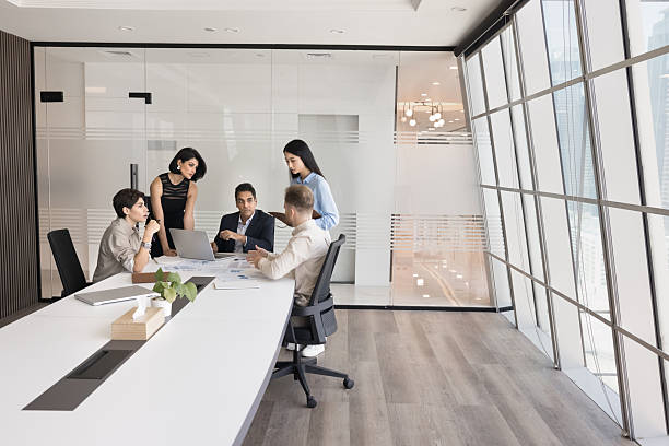Five diverse teammates solve business-related matters during briefing
