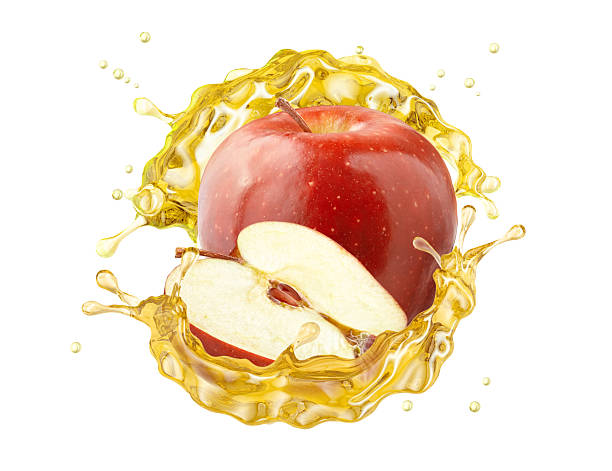 istock Red apple and apple slice with vibrant juice, cider, vinegar splash, isolated on white background. 2219332898