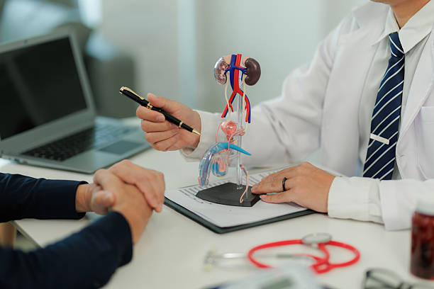 istock A doctor provides professional consultation on erectile dysfunction, discussing treatment options and offering close, supportive care for the patient's well-being. 2219333475