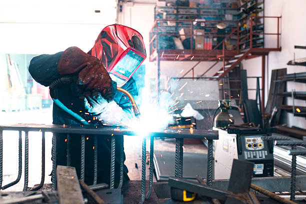 istock Skilled welder working in industrial workshop 2219333719