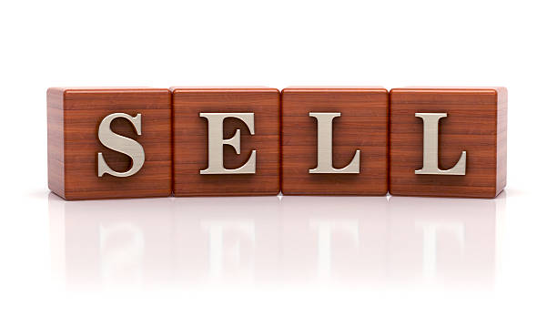 istock Sell written on wooden cubes 2219338317