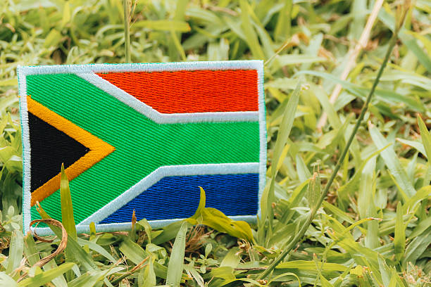 istock South African flag on grass. Eco Friendly background. Room for text. 2219340408