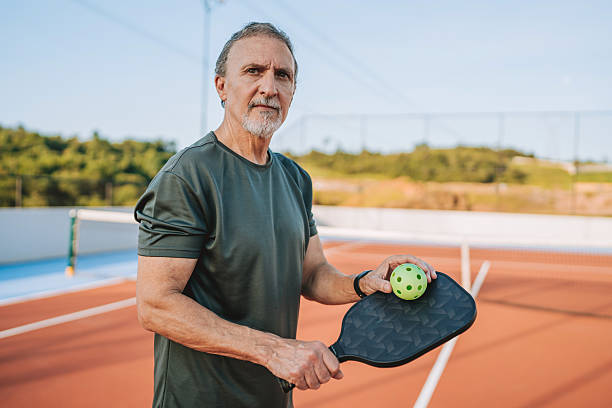 istock Mature elderly man plays pickleball 2219346755