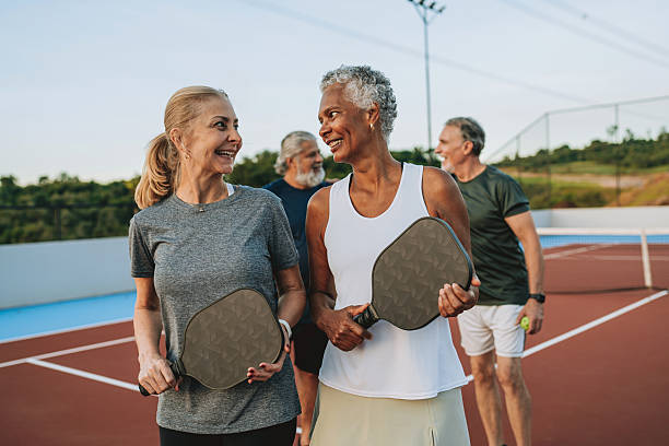 Group of people playing pickleball