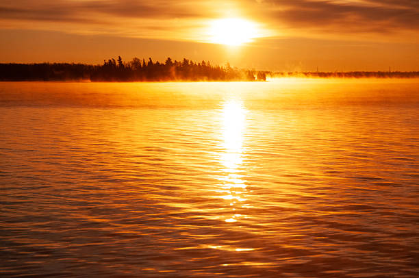 Stunning autumn sunrise over the big Rideau Lake in Ontario Canada