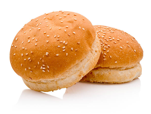 istock Two hamburger buns with sesame isolated on white background 2219349065