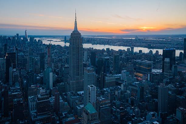 istock New York City skyline at sunset with Empire State Building 2219355238