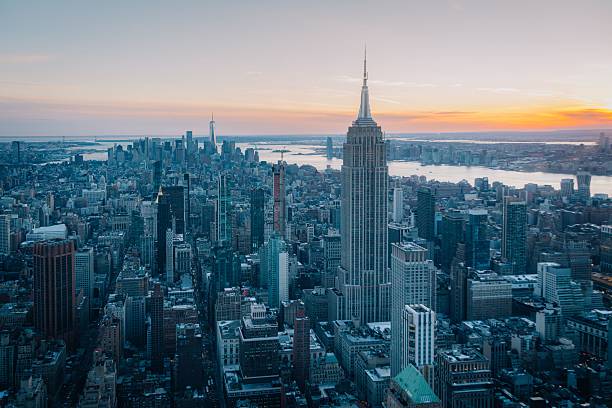 istock New York City skyline at sunset with Empire State Building 2219355247