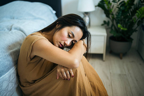 istock Asian woman struggles with mental breakdown alone at home. 2219358448