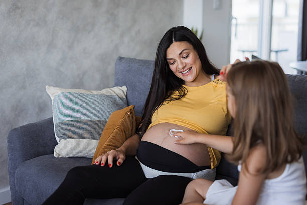 istock Taking care of a mommy's belly 2219361417