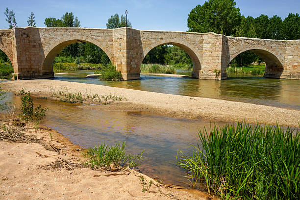 Pisuerga river by the stone bridge of Cervera de Pisuerga. Palencia