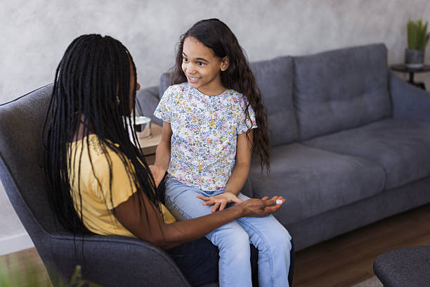 istock Cheerful girl talking to her mom 2219362124