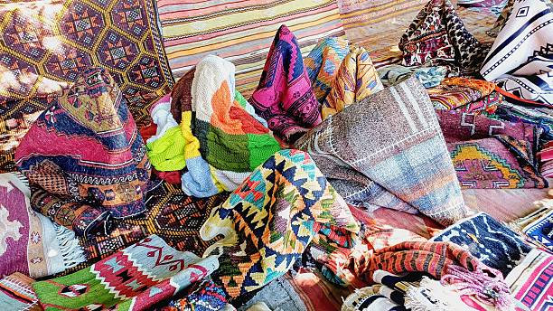 istock authentic handmade carpets and rugs sold in the market 2219363752
