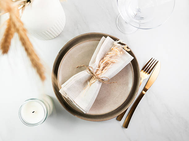 istock Elegant minimal table setting with wheat decoration in neutral tones 2219367058