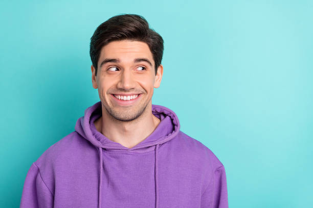 istock Photo of young attractive guy looking empty spacesee big sale bargain on black friday isolated on blue color background 2219367152
