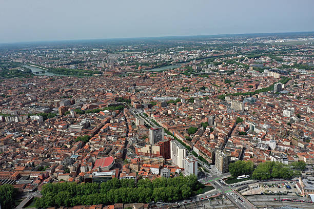 City panorama of beautiful Toulouse. Toulouse is the fourth-largest city in France and it is the  centre of the European aerospace industry. Captured on a sunny day during spring season.
