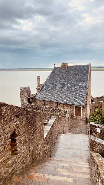 istock Le Mont Saint Michel may 2025 on a cloudy day 2219368016