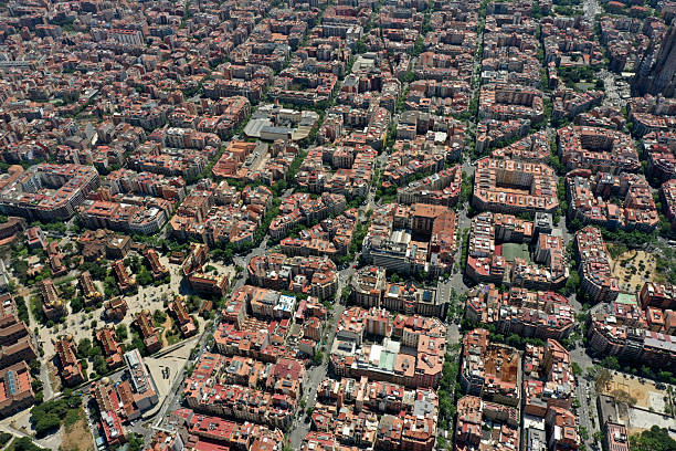 Barcelona City panoramic view. The image shows the wonderful capital of  of Catalonia with residential buildings, captured on a sunny day during spring season.