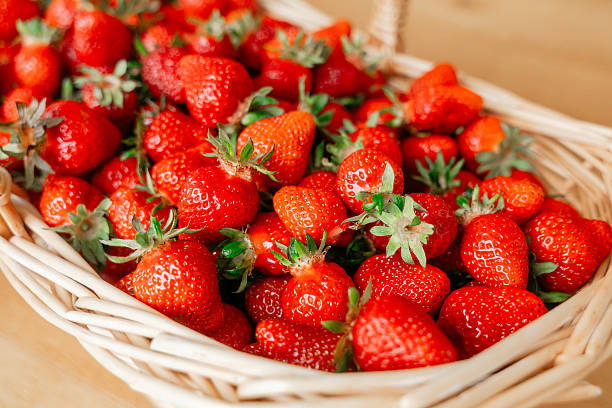 Fresh Strawberries Piled in a Wicker Basket
