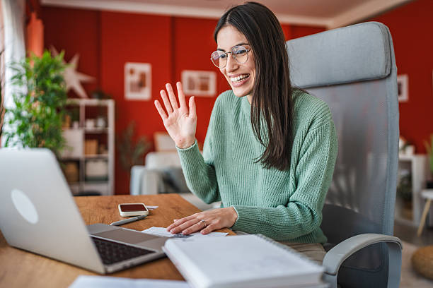 istock One woman working from home and making a video call 2219372782